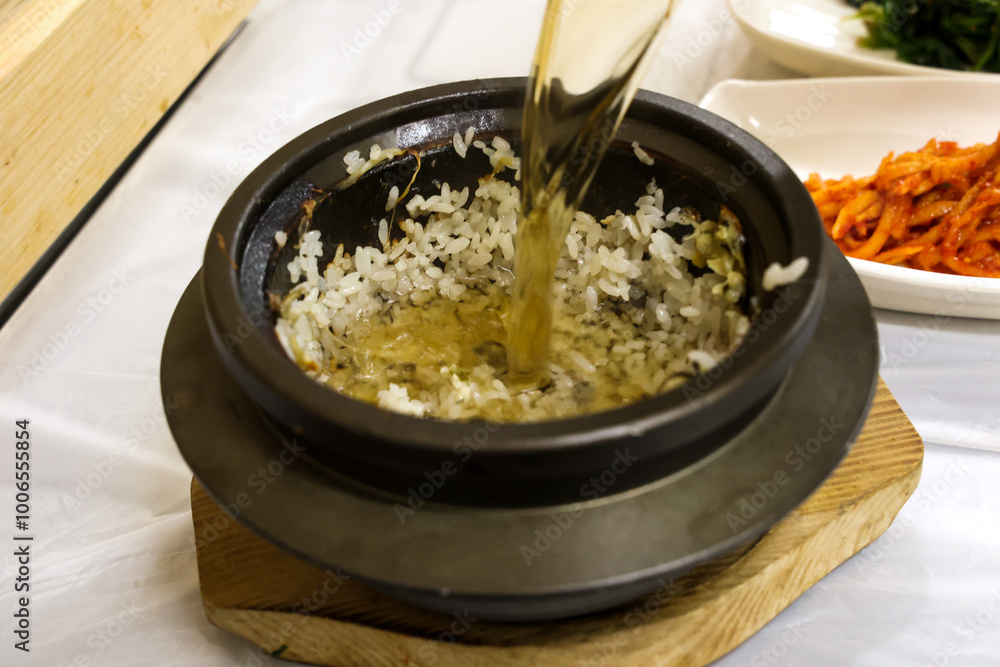 Scorhed Rice Images Korea food. hot pot scorched rice water Stock Photo | Adobe Stock