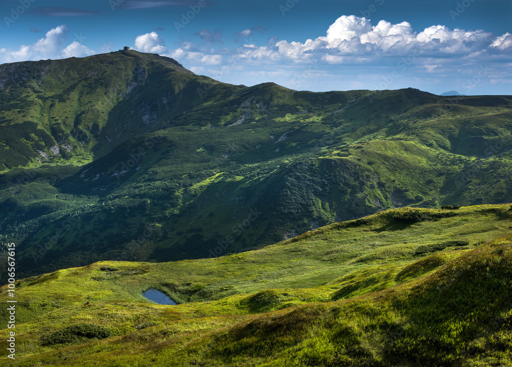 Pip Ivan mountain with observatory silhouette, alpine height and high mountain lake, Chornohirsky ridge, Carpathians, Ukraine Pip Ivan mountain with observatory silhouette, alpine height and high mountain lake, Chornohirsky ridge, Carpathians, Ukraine