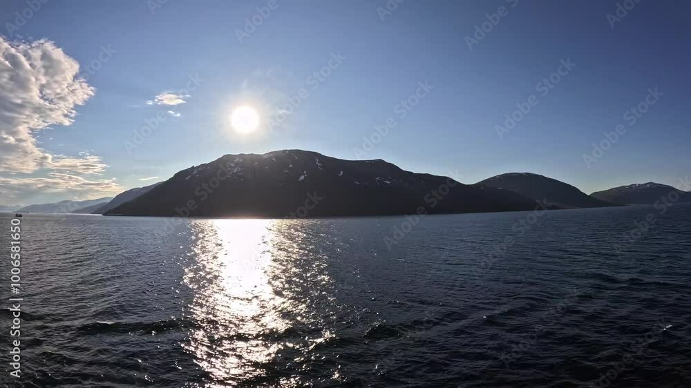 Kvitnes, Vannvåg, Lågmyra, Reinøya, Norway - timelapse cruising alongside the many islands, beautiful fjord landscape and snow covered mountain slopes Kvitnes, Vannvåg, Lågmyra, Reinøya, Norway - timelapse cruising alongside the many islands, beautiful fjord landscape and snow covered mountain slopes