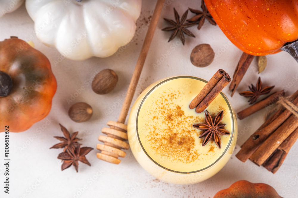 Autumn cozy drink, pumpkin spice eggnog cocktail, with honey, cinnamon sticks and anise stars, delicious dessert fall seasonal beverage Autumn cozy drink, pumpkin spice eggnog cocktail, with honey, cinnamon sticks and anise stars, delicious dessert fall seasonal beverage