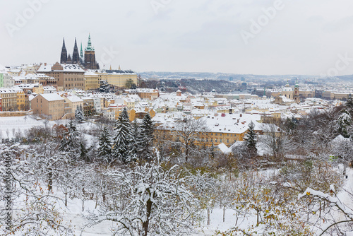 Obraz na płótnie Snowy Prague City with gothic Castle from the Hill Petrin, Czech republic w salonie