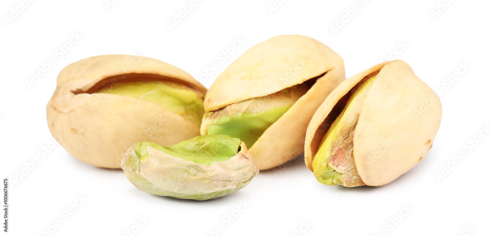 Many tasty pistachio nuts isolated on white Many tasty pistachio nuts isolated on white