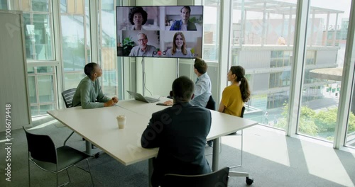 Businesspeople Having a Video conference in a Office Meeting room photo