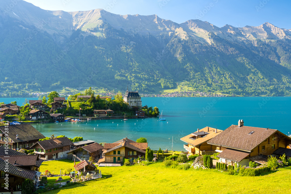 view on Iseltwald on Brienzersee lake with Alps in Switzerland