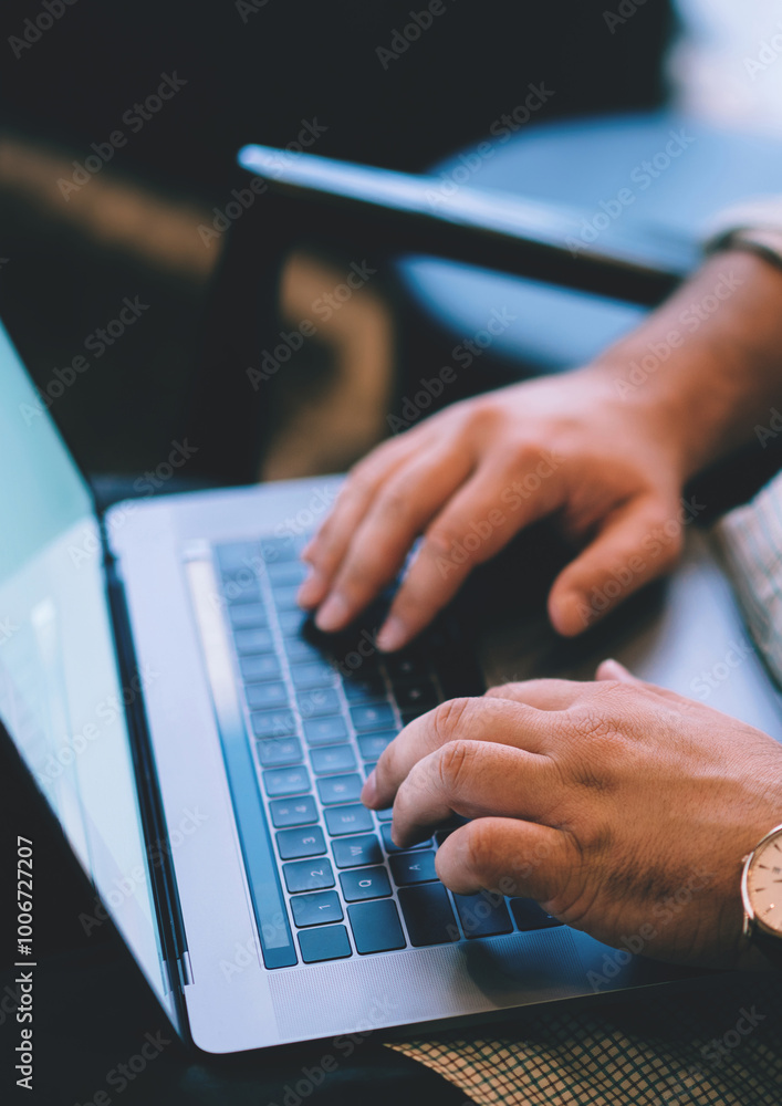 Εκτύπωση καμβά Close up view of male tattooed hands keyboarding email letter on laptop computer, cropped view with soft focus of internet user using technology for online communication