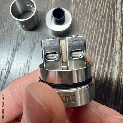 close up of hand holding a wrench