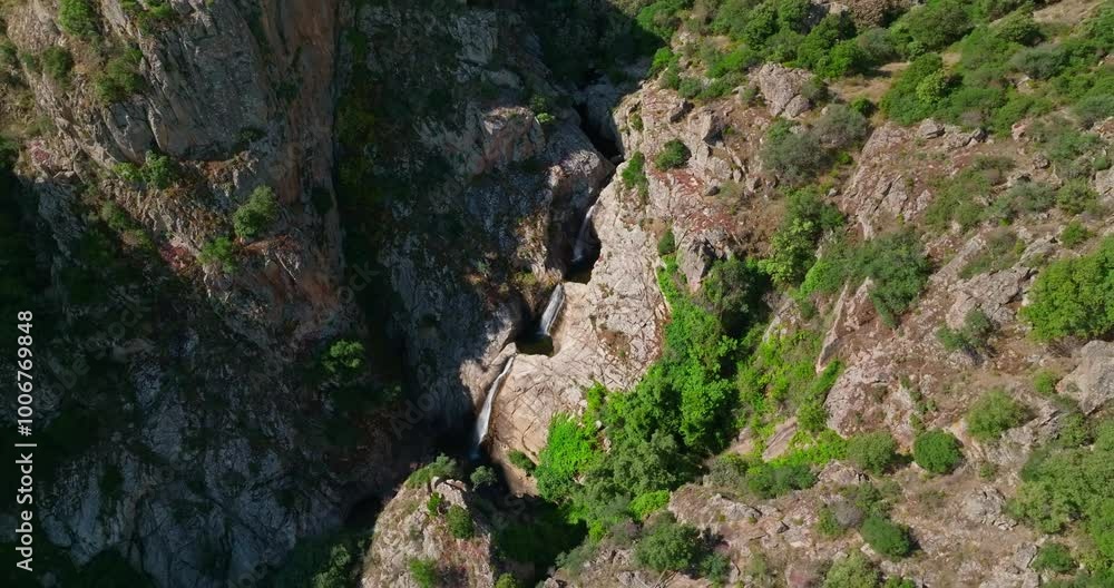 Panoramic shot of tripple waterfall in Sardinia, Italy Panoramic shot of tripple waterfall in Sardinia, Italy