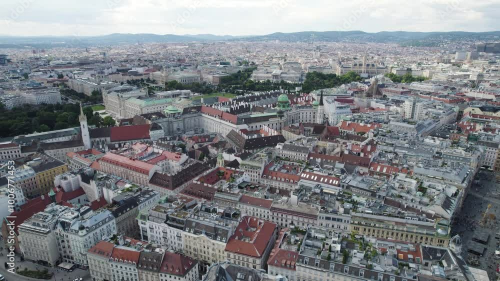 Establishing aerial shot of Heldenplatz and Hofburg in Vienna, Austria, showcasing their historic and grand architecture Establishing aerial shot of Heldenplatz and Hofburg in Vienna, Austria, showcasing their historic and grand architecture