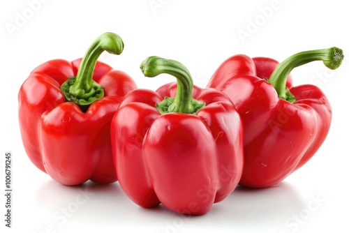 A group of red peppers arranged side by side