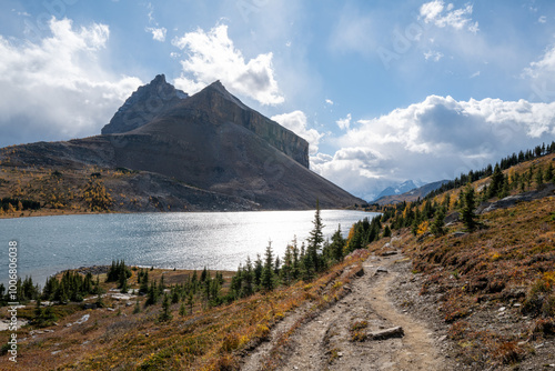 Ptarmigan Lake and Mount Redoubt on a sunny Autumn day with Deception Pass trail in frame.
