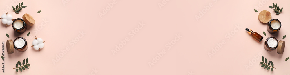 Cosmetic products and cotton flowers on pink beige background, flat lay. Banner design with space for text Cosmetic products and cotton flowers on pink beige background, flat lay. Banner design with space for text