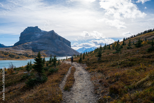 Ptarmigan Lake and Mount Redoubt on a sunny Autumn day with Deception Pass trail in frame.