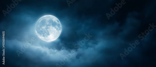  A full moon amidst a cloudy scene, with a dark-clouded foreground and background