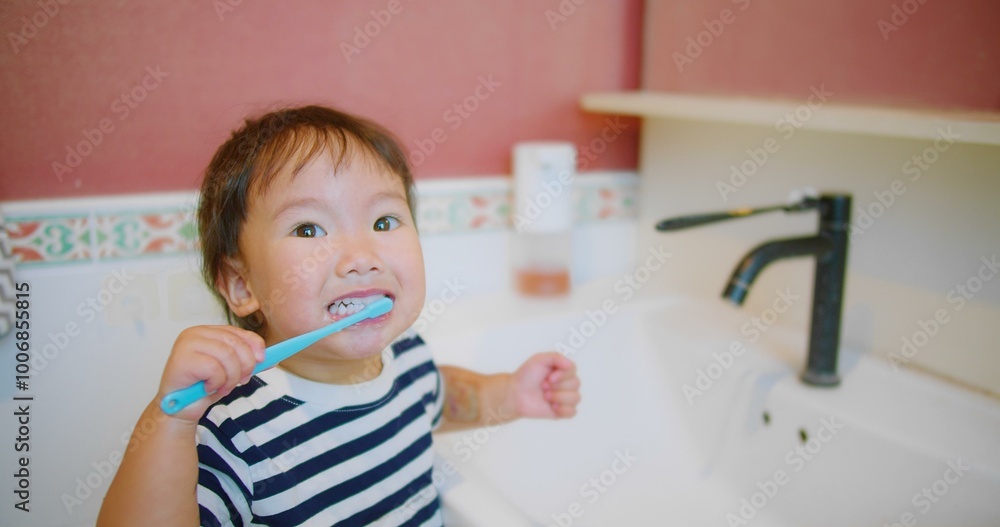 Happy Adorable little Child Brushing Teeth Smiling in Bathroom Morning Routine at Home Interior, showcasing a morning hygiene routine and healthy habits, Personal Care, Family Life, Childhood Moments Happy Adorable little Child Brushing Teeth Smiling in Bathroom Morning Routine at Home Interior, showcasing a morning hygiene routine and healthy habits, Personal Care, Family Life, Childhood Moments