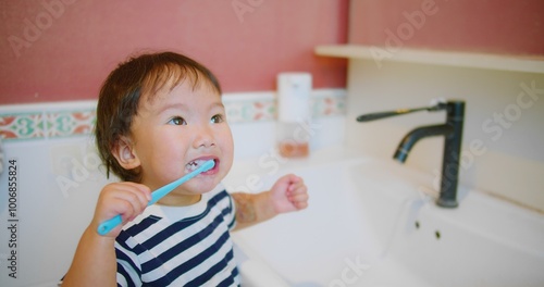 Happy Adorable little Child Brushing Teeth Smiling in Bathroom Morning Routine at Home Interior, showcasing a morning hygiene routine and healthy habits, Personal Care, Family Life, Childhood Moments