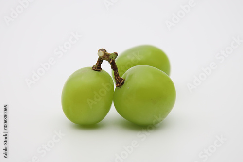 green grapes on a white background