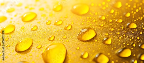 Vibrant Yellow Water Droplets Glistening on a Smooth Surface with Fine Details