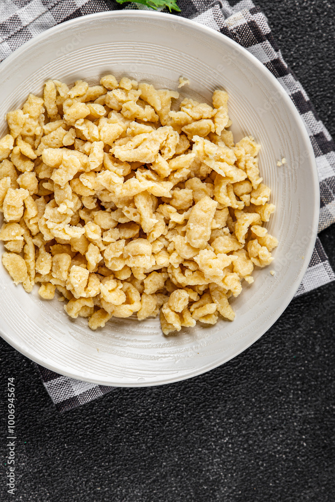 spaetzle egg pasta shape fresh meal food snack on the table copy space food background rustic top view spaetzle egg pasta shape fresh meal food snack on the table copy space food background rustic top view