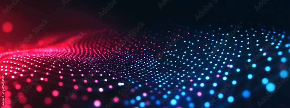 Fototapeta premium Abstract digital wave with glowing red and blue dots on a dark background.