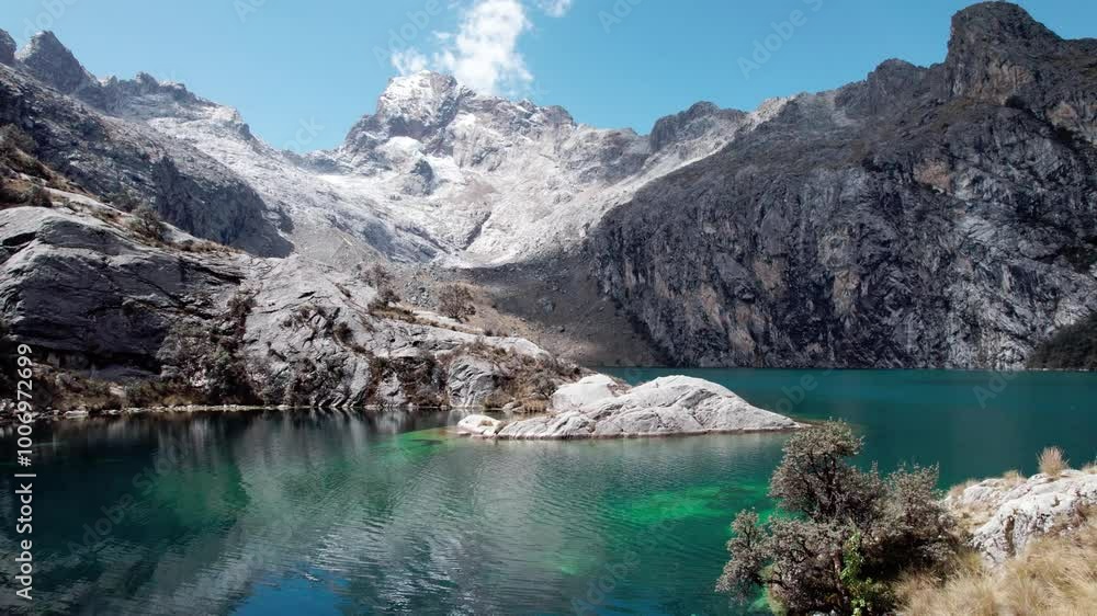 The Churup Lagoon with Turquoise Waters at the Foot of the Snow-Capped Cordillera Blanca is Located in the Huascaran National Park, in Ancash, Peru