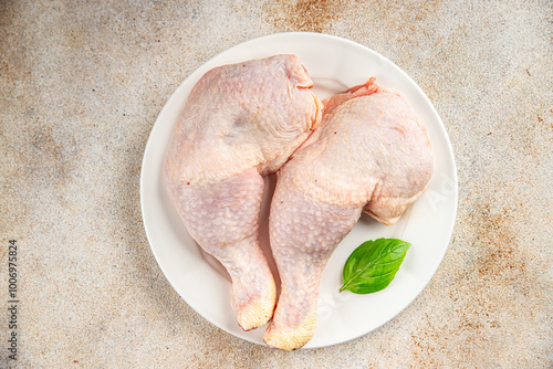 raw chicken legs meat chicken thighs poultry flesh on the bone gourmet fresh meal food snack on the table copy space food background rustic top view photo