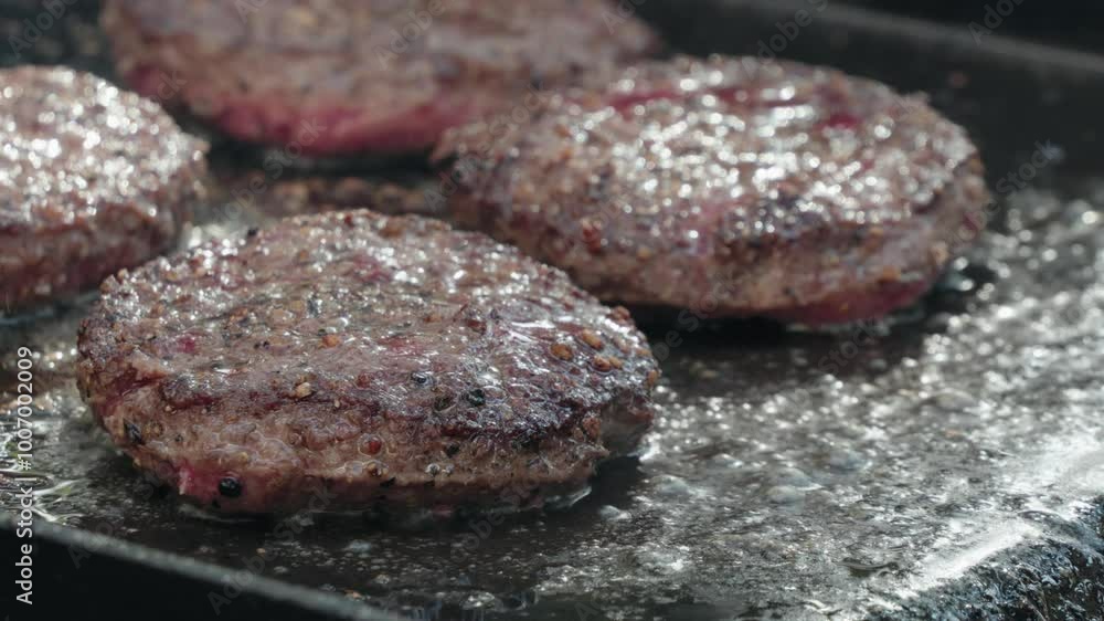 Cooking hamburger patties outside Cooking hamburger patties outside