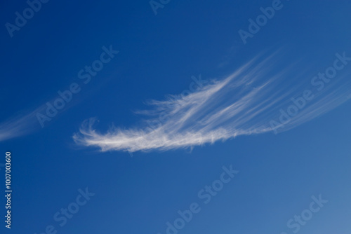 Blue sky cirrus clouds.