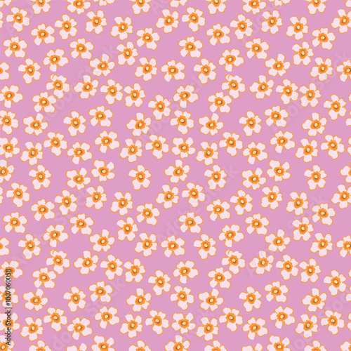 Small colorful flowers and brown flowers, hand drawn. Seamless on a light yellow background. Designed for fabric, fashion, textiles, wallpaper,