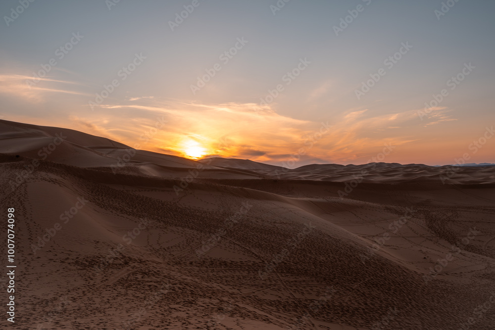 Sunset over the sand dunes of Merzouga, Morocco. Sunset over the sand dunes of Merzouga, Morocco.