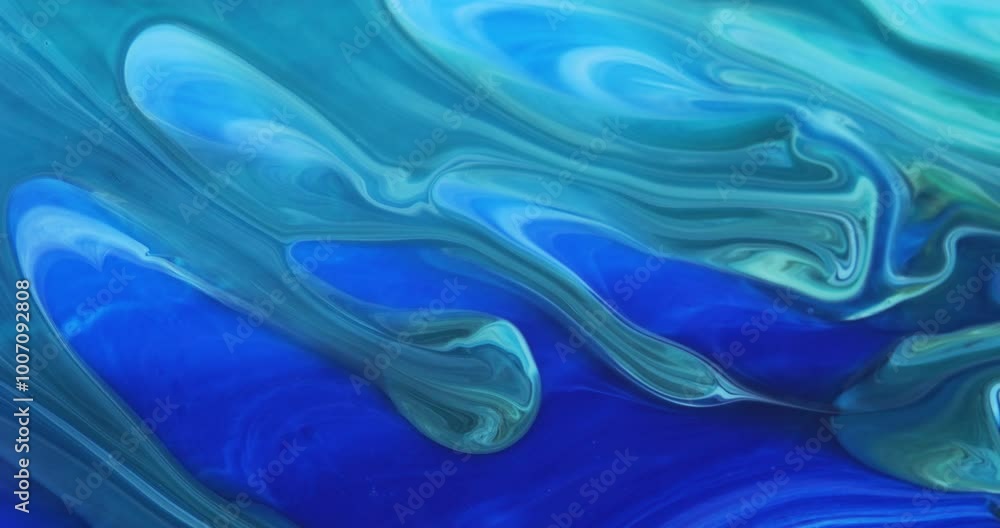 Blue background with unique moving streaks of blue, white, lilac tones. Abstract art. Marble texture. Blue background with unique moving streaks of blue, white, lilac tones. Abstract art. Marble texture.