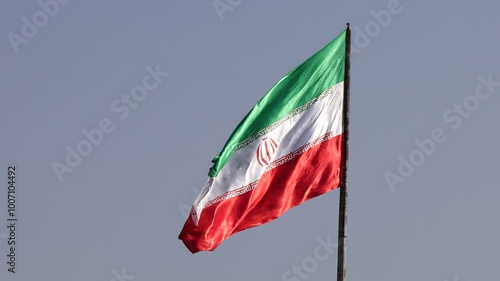 Iranian flag waving in the wind. Real Iran flag