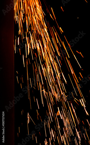 iskry, pomarańczowe iskry, iskry ze szlifierki, orange sparks, sparks from the grinder, Sparks from cutting metal of angle grinder, spark from the grinding wheel	