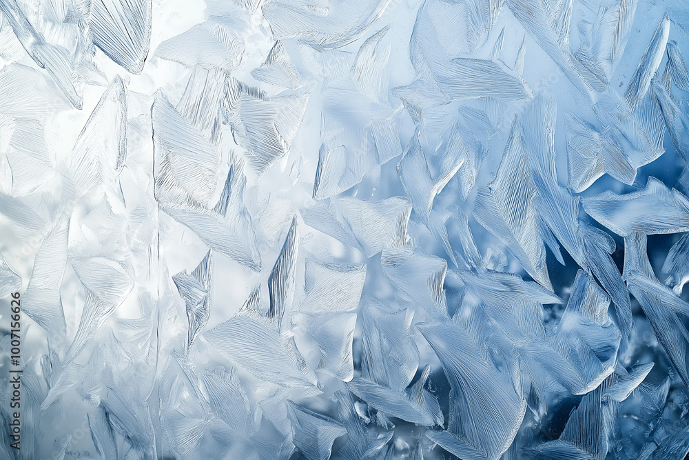 Ice pattern on the glass surface gradient from white to dark blue Ice pattern on the glass surface gradient from white to dark blue