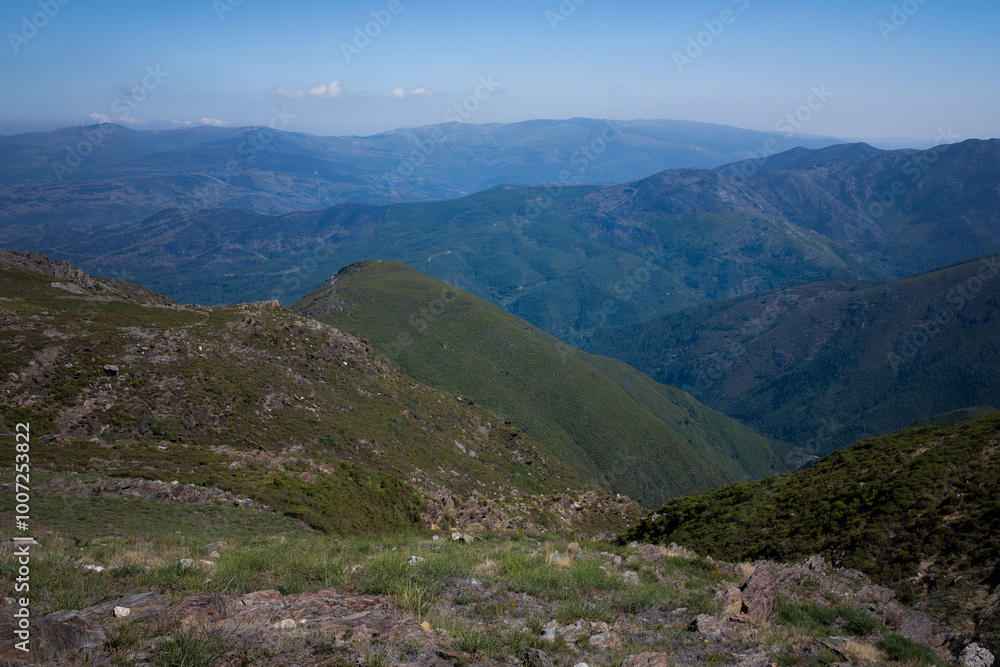 A panoramic view of the mountains in Portugal, showcasing the rugged beauty and vast landscapes under a clear sky. A panoramic view of the mountains in Portugal, showcasing the rugged beauty and vast landscapes under a clear sky.