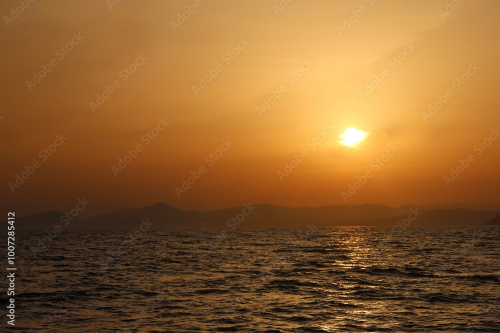 sunset over the sea sunset over the sea