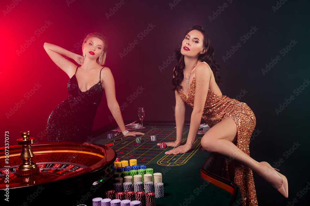 Photo of alluring gorgeous hot girls have christmas weekend in casino club bluff poker game Photo of alluring gorgeous hot girls have christmas weekend in casino club bluff poker game