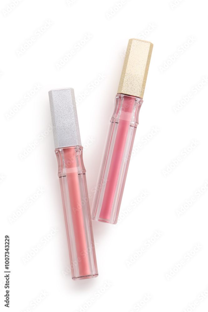Beautiful liquid pink lipsticks in different shades on white background Beautiful liquid pink lipsticks in different shades on white background