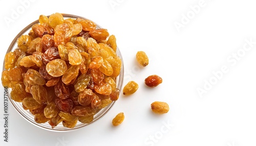 A raisin is a dried grape. Raisins are produced in many regions of the world and may be eaten raw or used in cooking, baking, and brewing, Isolated on white background with copy space. yellow variety