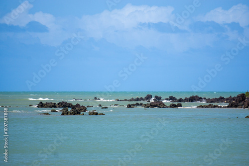 Fishing boats on the ocean. Ponta Negra Beach, Natal, Brazil.