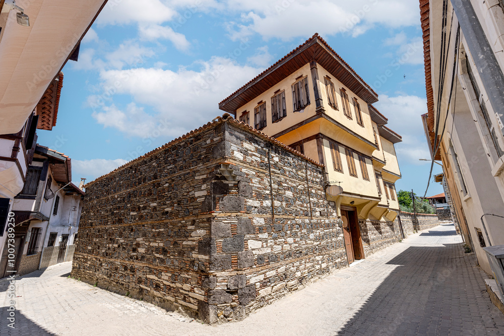 Traditional wooden Kula houses in Turkish and Ottoman architectural style, Manisa, Türkiye. Kula houses; are wooden houses called TURKISH HOUSES during the 18th century Ottoman Empire. Traditional wooden Kula houses in Turkish and Ottoman architectural style, Manisa, Türkiye. Kula houses; are wooden houses called TURKISH HOUSES during the 18th century Ottoman Empire.