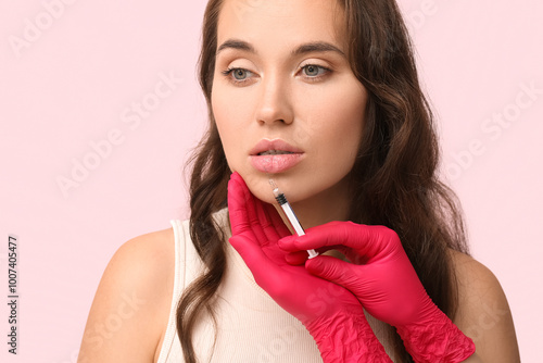 Beautiful young woman recei...