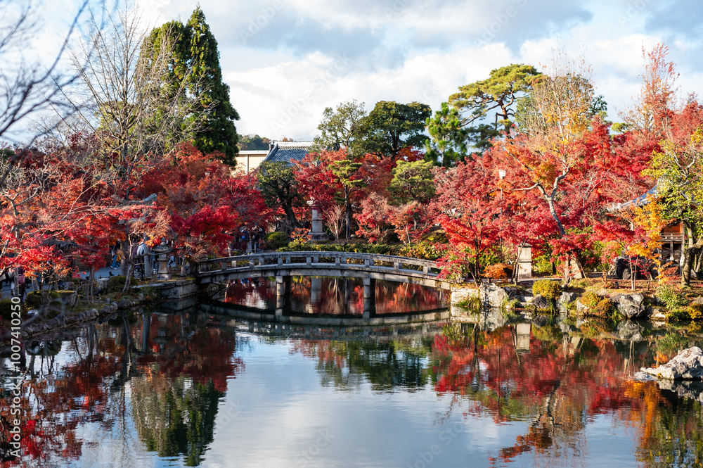 Scenic Bridge and Autumn Foliage Reflected in Garden Pond Scenic Bridge and Autumn Foliage Reflected in Garden Pond