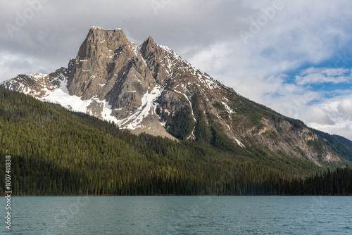 Stunning nature scenes at Emerald Lake, Yoho National Park during summer time with view on turquoise water, huge mountain peak and boreal forest of Canada in the wilderness area, immense beauty. 