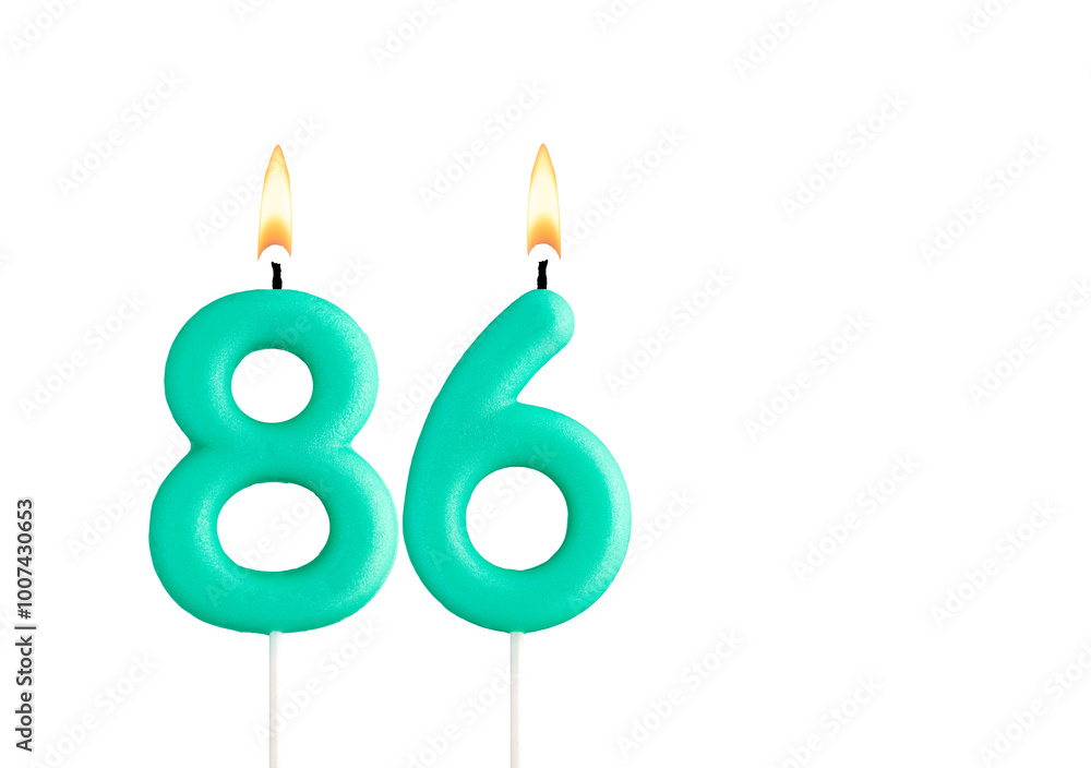 Green birthday candle on white background - Candle number 86 Green birthday candle on white background - Candle number 86