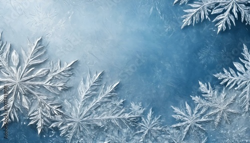 Wallpaper Mural Frosted snowflakes on a blue icy background for winter season decoration Torontodigital.ca