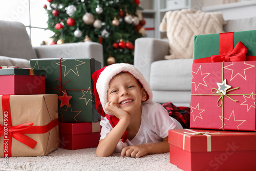 Cute little boy in Santa ha...