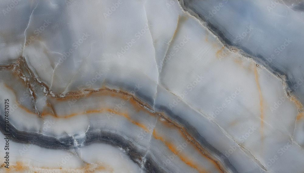 Marble slab with a complex pattern of veins and swirls in shades of gray, white, and gold Marble slab with a complex pattern of veins and swirls in shades of gray, white, and gold