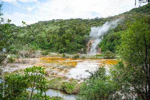 Volcanic landscape with geothermal pools and lush vegitation at War-O-Tapu Rotorua New Zealand 