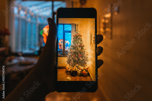 Smartphone Camera pointing at Cosy Festive Lounge with Christmas Tree and Gifts in Early Hours of Morning