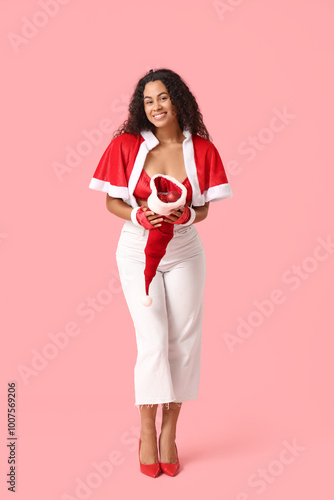 Smiling young woman in sant...